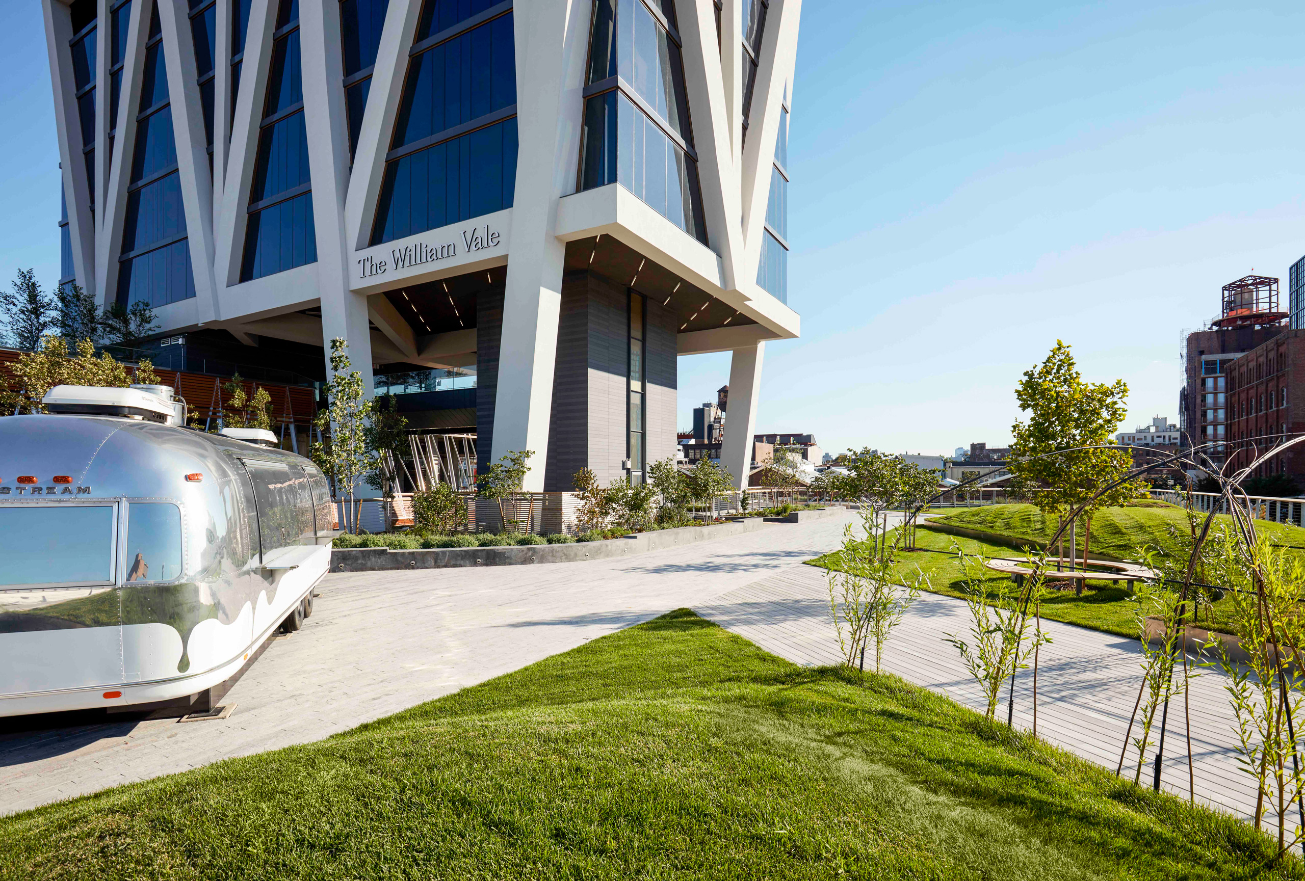 The William Vale entrance beside silver Airstream trailer.