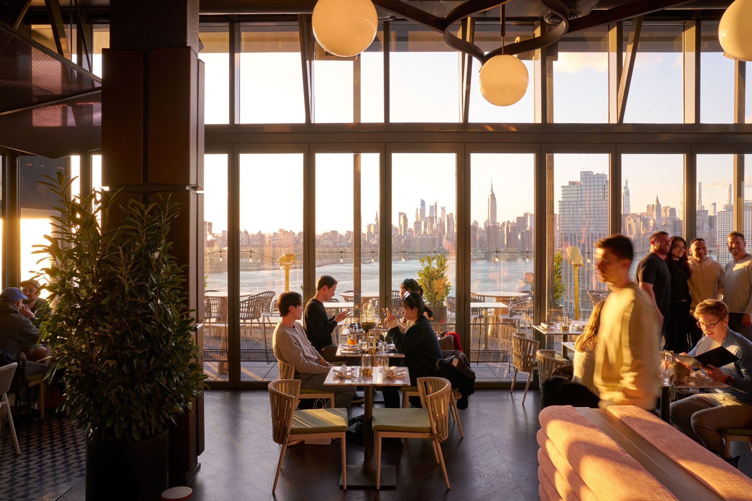 Guests enjoy skyline views while dining at Westlight.