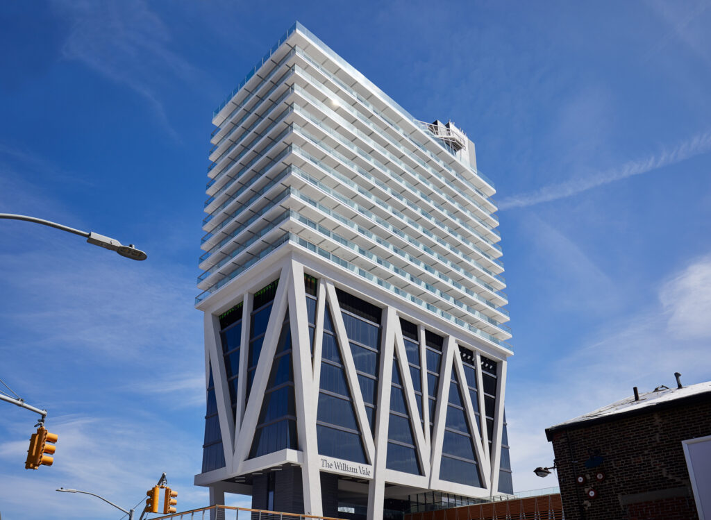 Modern high-rise building with geometric facade