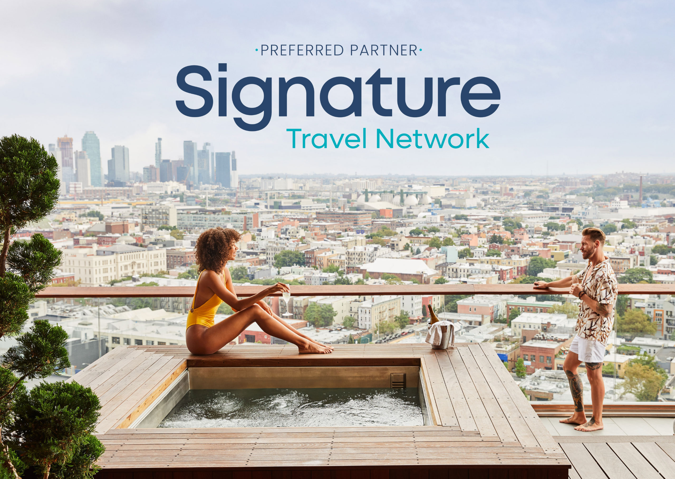 Woman sitting by jacuzzi and man on balcony of Vale Garden Residence