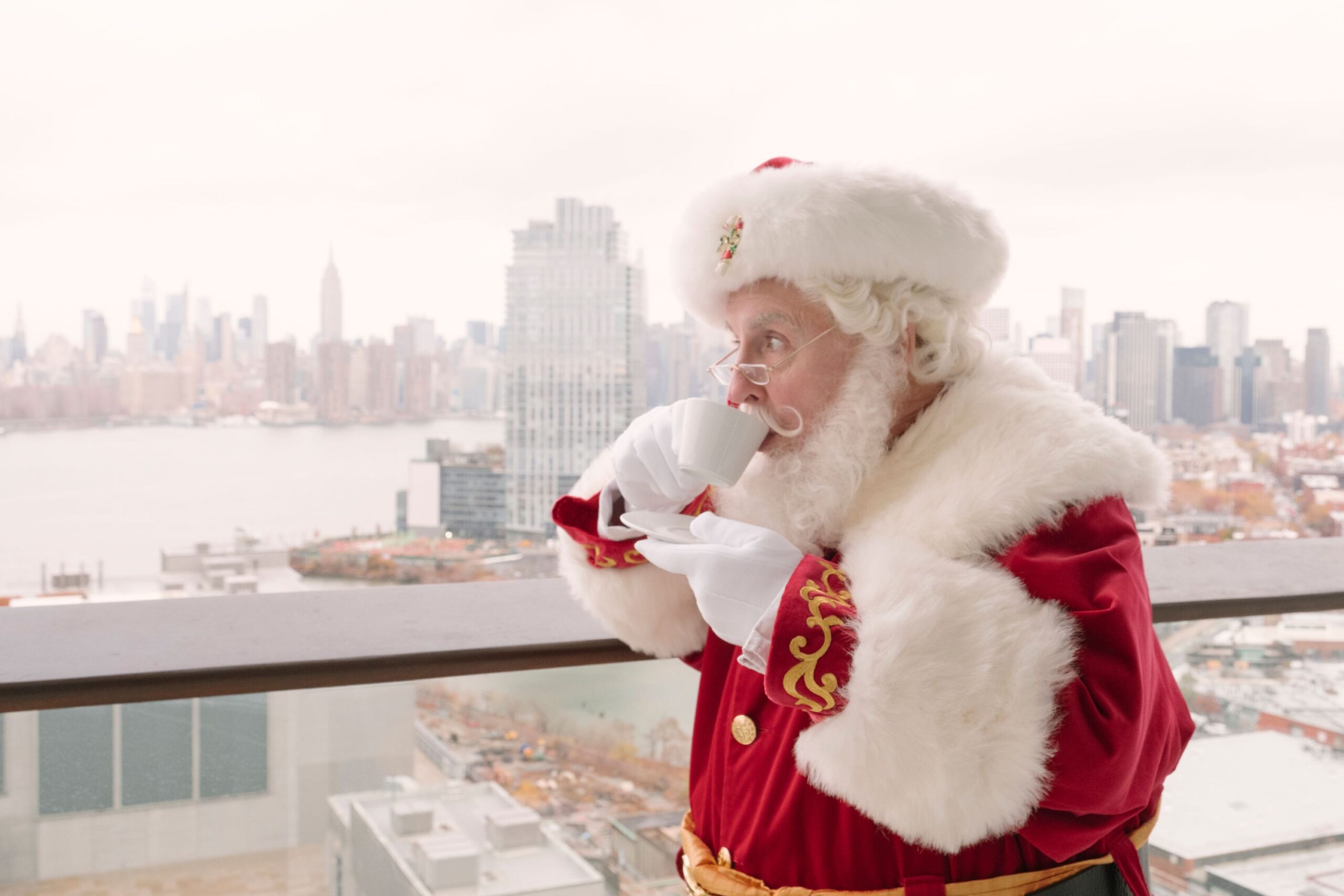 Santa drinks coffee from his private balcony at The William Vale.