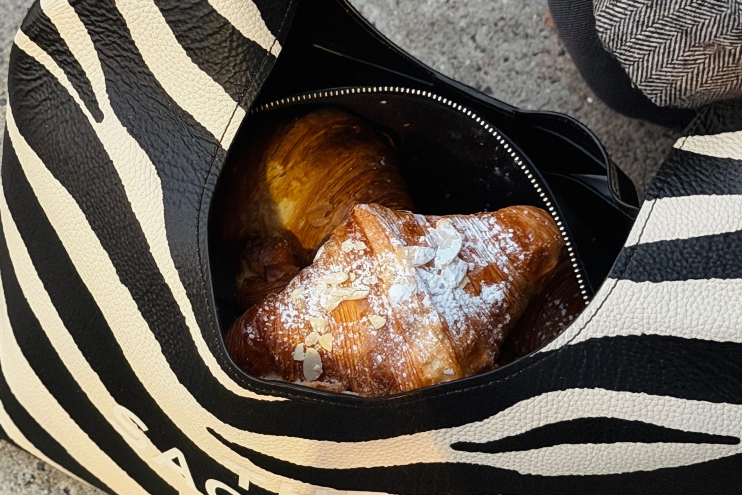 Croissants are tucked away in a designer bag.