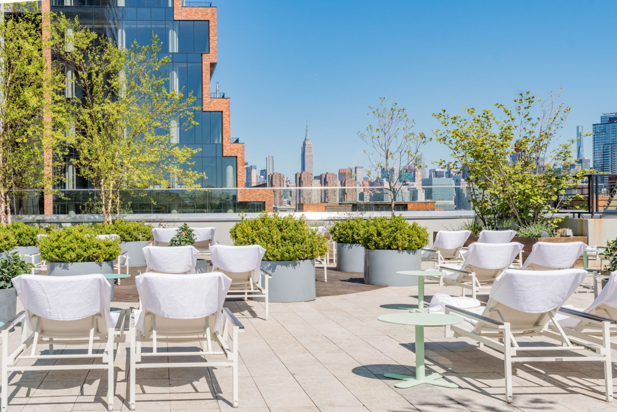 Terrace seating at Vale Pool boasts incredible views of the Empire State Building.