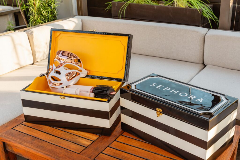 Sephora Beauty Library items displayed poolside