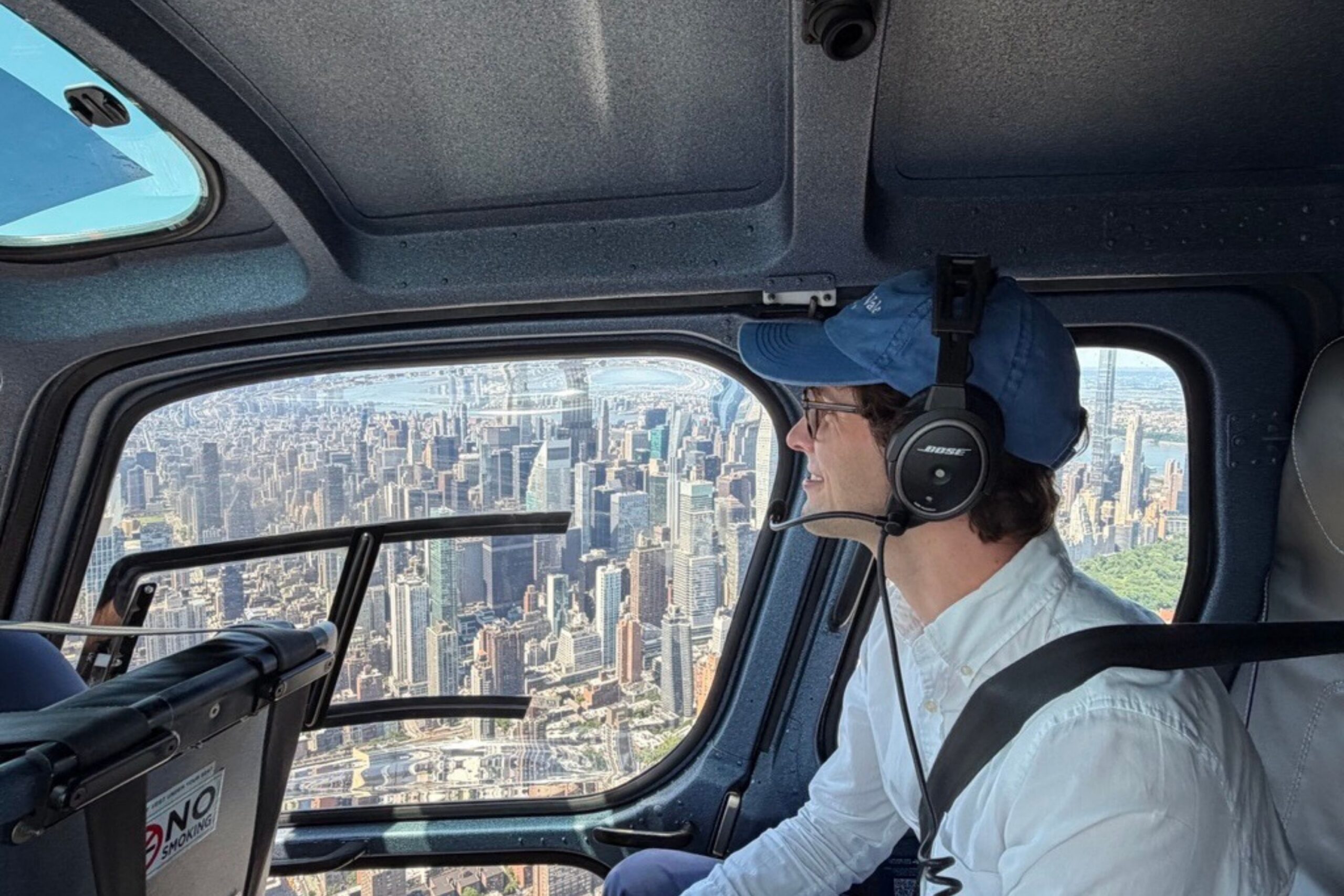 Guest takes in Manhattan skyline view from helicopter